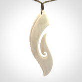 Hand carved large bone hook pendant
