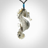 A hand carved labradorite seahorse pendant. We have carved this from beautiful labradorite and we bind them with our hand-plaited cords. The cords are a waxed polyester so they are durable and strong. We ship these worldwide with express courier anywhere in the world.