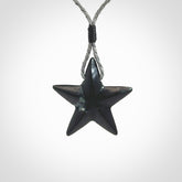 Hand carved black jade star pendant. Hand made black jade star pendant with adjustable cord.