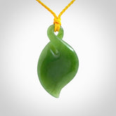 Hand carved New Zealand jade, single twist pendant with adjustable cord.