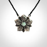 Hand crafted silver manuka flower pendant with jade insert