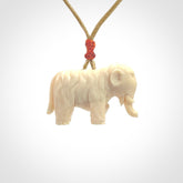 Hand carved woolly mammoth pendant. Carved from woolly mammoth tusk by NZ Pacific.
