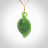 Hand carved New Zealand jade, single twist pendant. Jade twist pendant hand carved in New Zealand. Made by NZ Pacific, jade jewellery for sale online. One only hand made by Ross Crump.