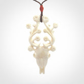 This is a hand carved contemporary bison bone skull pendant. This is a medium sized necklace and is a very unique pendant that is a piece for bison lovers.