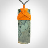A Striking Jade Toki Pendant