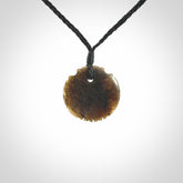 Subtle yet Striking Art to Wear! Hand carved New Zealand Jade pendant