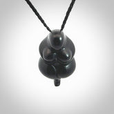 Black jade goddess pendant. Hand carved by NZ Pacific. Black Jade jewellery for sale online. Midnight Goddess is provided on a black adjustable cord and packaged in a woven kete pouch.