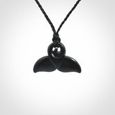 Hand carved Australian Black Jade whale tail pendant. Small whale tail necklace with adjustable cord.