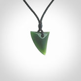Hand carved pounamu niho, drop pendant. Jade necklace hand made in New Zealand.