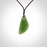 Hand carved pounamu drop pendant. Jade necklace hand made in New Zealand.