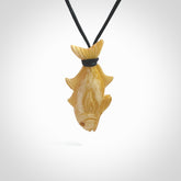 Hand carved stained bone fish pendant. Hand made stained bone fish necklace. Fish themed jewellery. Ocean themed pendant. Bone fish necklace provided with adjustable cord and free delivery.