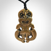 A beautiful hand made, bronze tiki pendant.