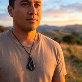Man wearing jade hook pendant
