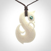 Hand carved bone manaia pendant. Made by NZ Pacific and for sale online. Free worldwide shipping.