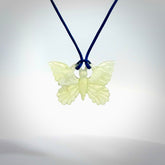 Hand carved Prehnite Crystal butterfly Pendant. Made by NZ Pacific and for sale online. Exotic, Hand made butterfly Jewellery.