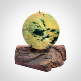 Hand carved New Zealand Flower Jade Disc with wooden stand sculpture. Hand carved here in New Zealand by Alex Sands Studio. This is a 'one only' sculpture, a beautiful display piece.