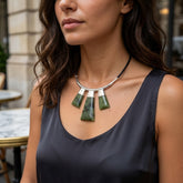 Woman wearing jade and silver necklace