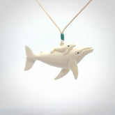 Hand carved bone whale pendant. Carved by NZ Pacific in natural bone.