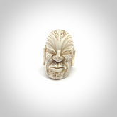 Hand carved Moko man face ring. Made from Red Deer antler in New Zealand. Unique Moko Man ring hand made from deer antler by master bone carver Fumio Noguchi. Spectacular collectable work of art, made to wear. One only ring, delivered to you at no extra cost with express courier.
