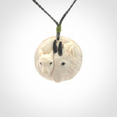 Merino and ewe pendant carved in mammoth tusk