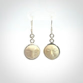 Hand made woolly mammoth tusk moon face earrings. Made by NZ Pacific and sale online only.