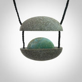 Greywacke stone pendant with Aotea Stone insert. Hand carved by Rhys Hall for NZ Pacific. Handmade contemporary jewellery for sale online.