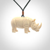 Hand carved Rhinoceros pendant. Carved from woolly mammoth tusk by NZ Pacific.