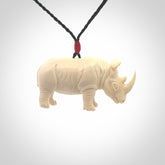 Hand carved Rhinoceros pendant. Carved from woolly mammoth tusk by NZ Pacific.