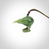 A beautiful little, handcarved kiwi pendant. This piece is carved from jade from Aceh and is a remarkably unique piece of handmade jewellery. made by NZ Pacific and for sale on our website. Shipping is free worldwide.