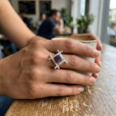 Woman wearing ruby hashtag ring