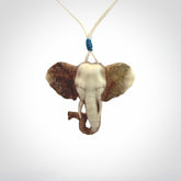 These are hand made elephant pendants, carved in a Deer Antler. The cord is length adjustable. Provided in a woven kete pouch and delivered with express courier.
