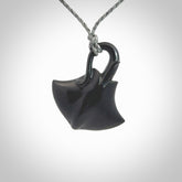 Hand carved black jade stingray pendant. Handmade by NZ Pacific from real black jade. Black Jade jewellery for sale online.