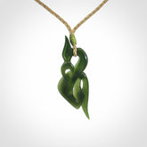 A Gorgeous Dark Green Jade Manaia Pendant