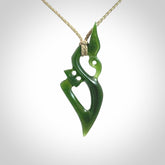 A beautiful hand carved New Zealand Jade Manaia pendant with adjustable cord.