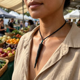 Woman wearing black jade unicorn horn pendant by NZ Pacific