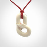 Hand carved white snake pendant made from Deer antler in New Zealand. Hand made by master bone carver Fumio Noguchi. Spectacular collectable work of art, made to wear. One only pendant, delivered to you at no extra cost with express courier.