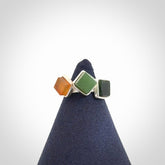 This is a handcrafted New Zealand Pounamu, Jade with Chalcedony and sterling silver ring.