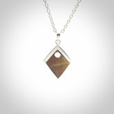 Hand carved mammoth tusk necklace. Made by NZ Pacific and for sale online only. Original and authentic handcrafted jewellery.