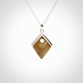 Hand carved mammoth tusk necklace. Made by NZ Pacific and for sale online only. Original and authentic handcrafted jewellery.