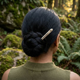 Woman wearing bone hair pin