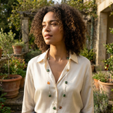 woman wearing a jade necklace