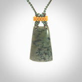 Hand carved New Zealand Jade pendant with adjustable cord. This piece is a stand out work of creativity and skill and we love Jen Hung's creations. Unique, one only, New Zealand made necklace for sale. Free shipping worldwide.
