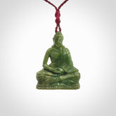 Hand carved jade buddha pendant