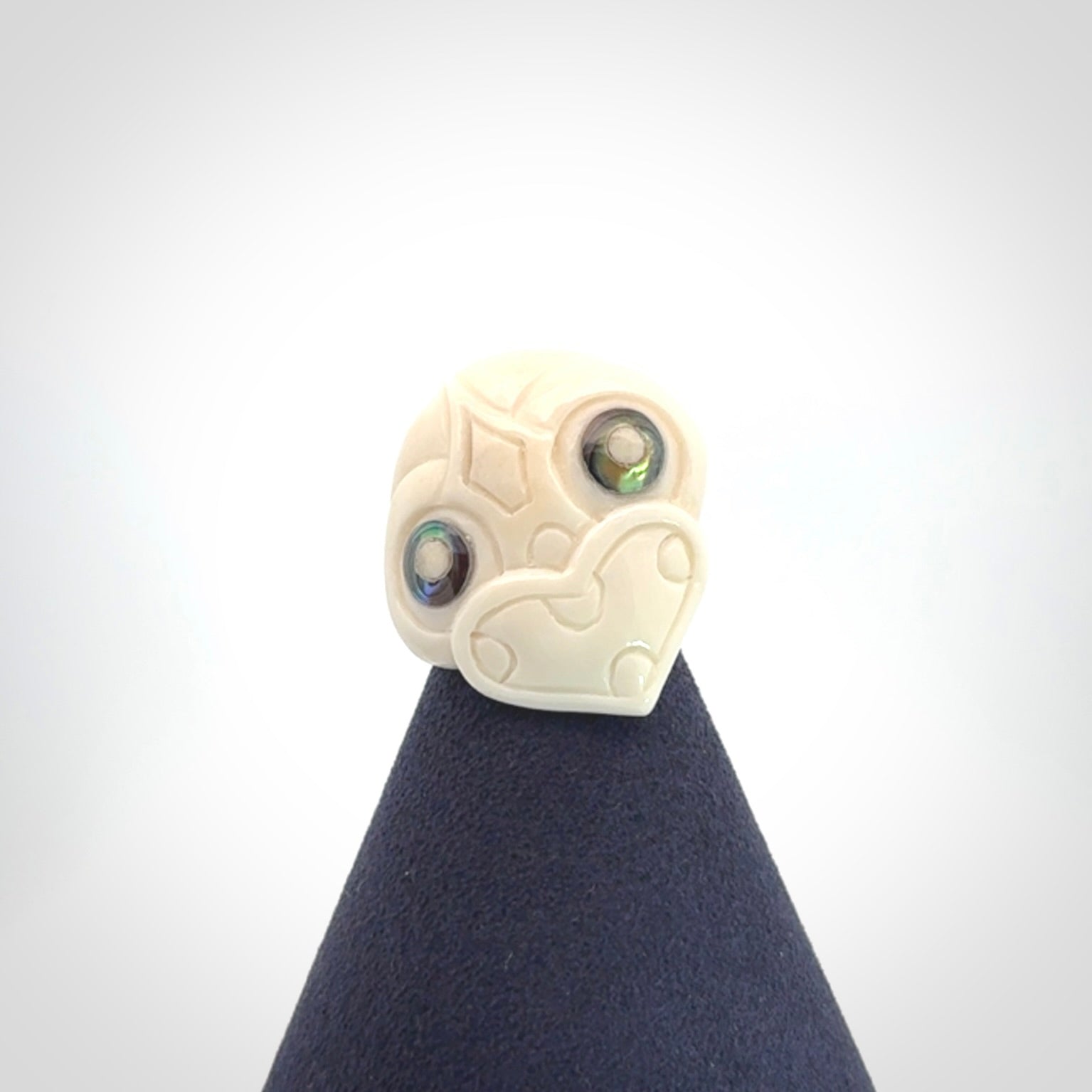Hand carved bone tiki ring