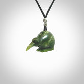 Hand carved Jade kiwi pendant for lovers of birds. Hand made kiwi necklace with black adjustable cord. Unique gifts and Art to Wear by NZ Pacific.