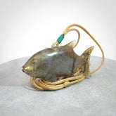 Hand carved Labradorite Trevally fish pendants.