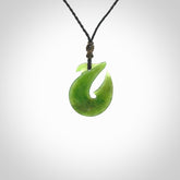 Hand carved New Zealand Jade Hook Pendant. Hand made Jade Hook, matau necklace provided with adjustable cord.
