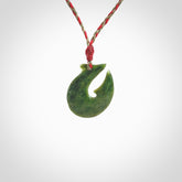 Hand carved New Zealand Jade Hook Pendant. Hand made Jade Hook, matau necklace provided with adjustable cord.