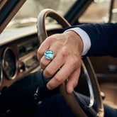 Man wearing paua and silver ring
