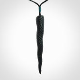 A Wonderful Unicorn Horn Pendant, Carved in Black Jade